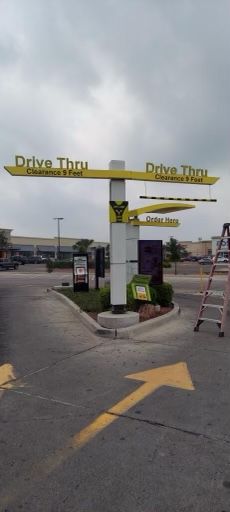 Designed and installed clear, eye-catching directional signage for McDonald's drive-thru, streamlining customer navigation.